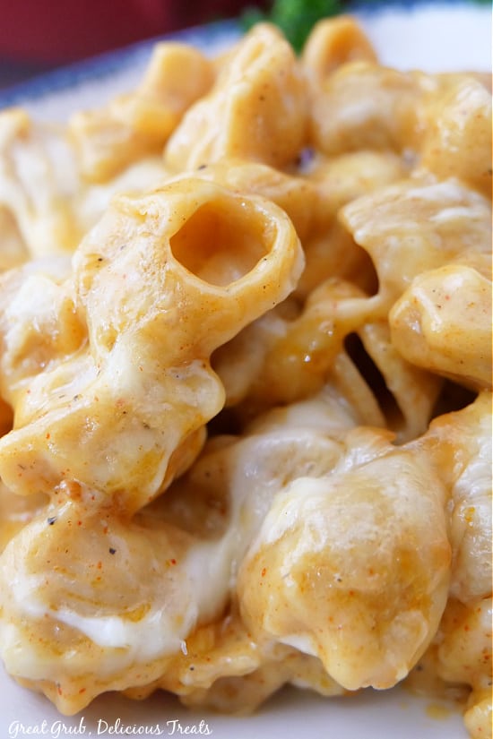 Smoked Mac and Cheese is loaded with so much smoky flavor, cheese, and is creamy and delicious. A close up picture of smoked mac and cheese.
