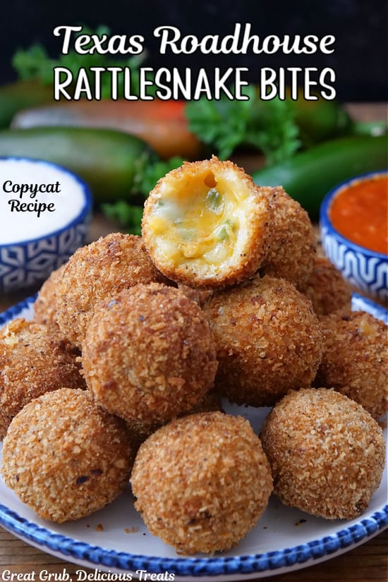 A white plate with blue trim with a stack of about a dozen cheese filled crunchy, copycat Texas Roadhouse Rattlesnake Bites.