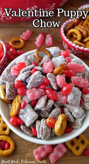 Valentine Puppy Chow Mix is a simple and easy snack to make that everyone will surely love. A white bowl filled with Valentine Puppy chow.